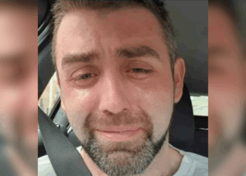 De laatste foto van Phillip Herron, een alleenstaande vader van drie,  slechts minuten voordat hij zichzelf van het leven beroofde. De reden hierachter raakt iedereen diep