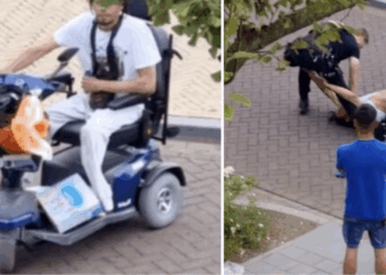 Politie onder vuur na heftige video: man zonder benen wordt uit zijn scootmobiel getrokken